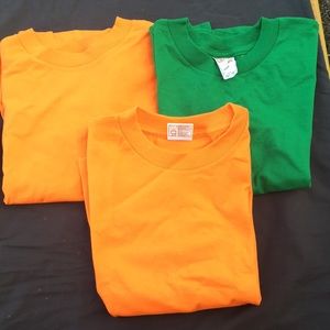 3 youth large (7) tshirts. 2 Orange and 1g…